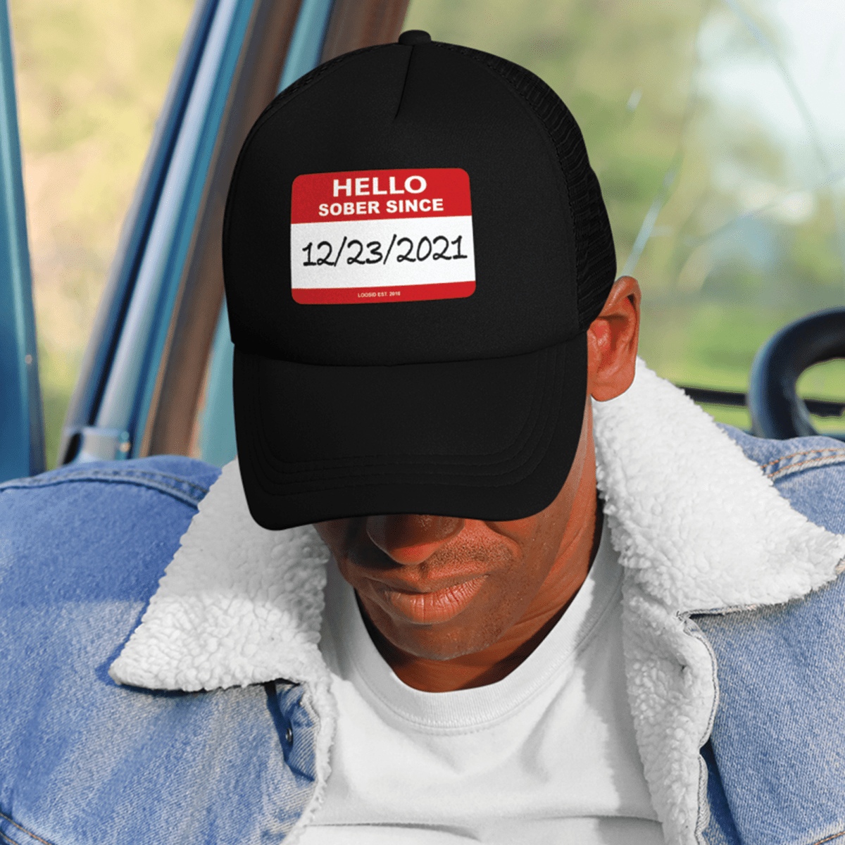 Hello Sober Since Sober Hat flat lay styled image (view 3)