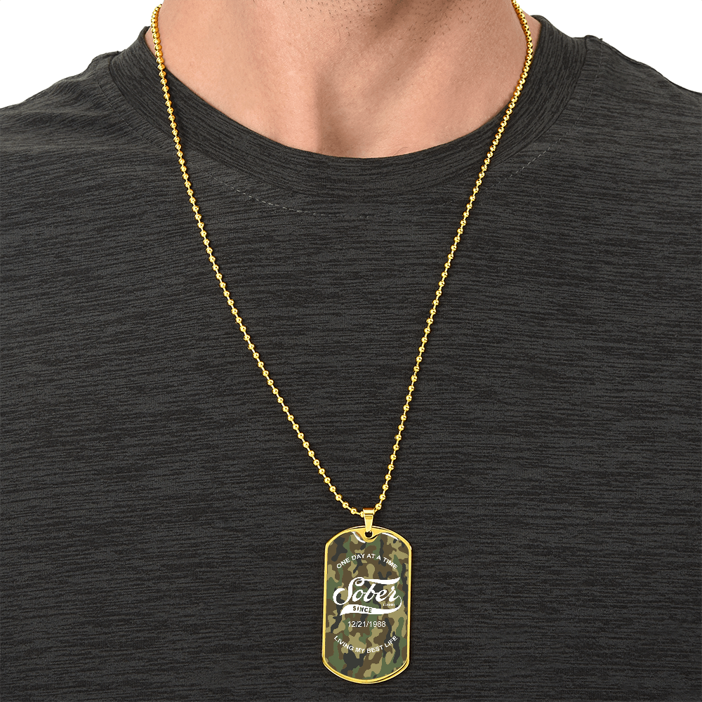 Sobriety Gift camo necklace shown in lifestyle flat lay