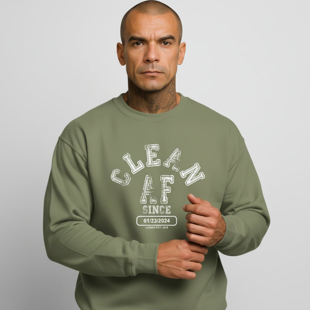 Flat lay of Loosid olive green Clean AF Since personalized sobriety gift crewneck sweatshirt β Loosid