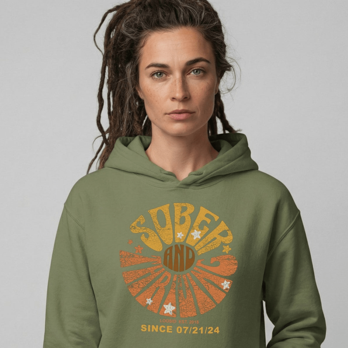Sober & Thriving Recovery Hoodie flat lay styled image (view 23)