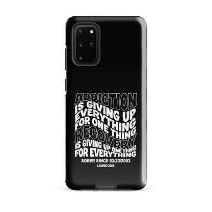Addiction is Giving Up Recovery Phone Case flat lay styled image (view 3)