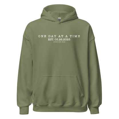 One Day At a Time Recovery Hoodie flat lay styled image (view 23)